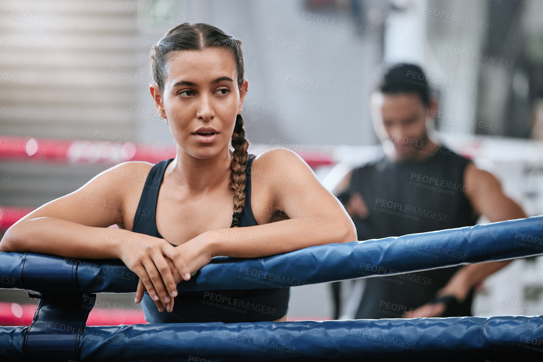 Buy stock photo Fit, active and tired boxer taking break, resting and breathing after workout, training and exercise with boxing coach in ring. Sporty, athletic or strong woman after kickboxing fight or sports match