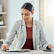 Female Manager Book Female manager, boss or CEO writing notes in her diary, marking ...
