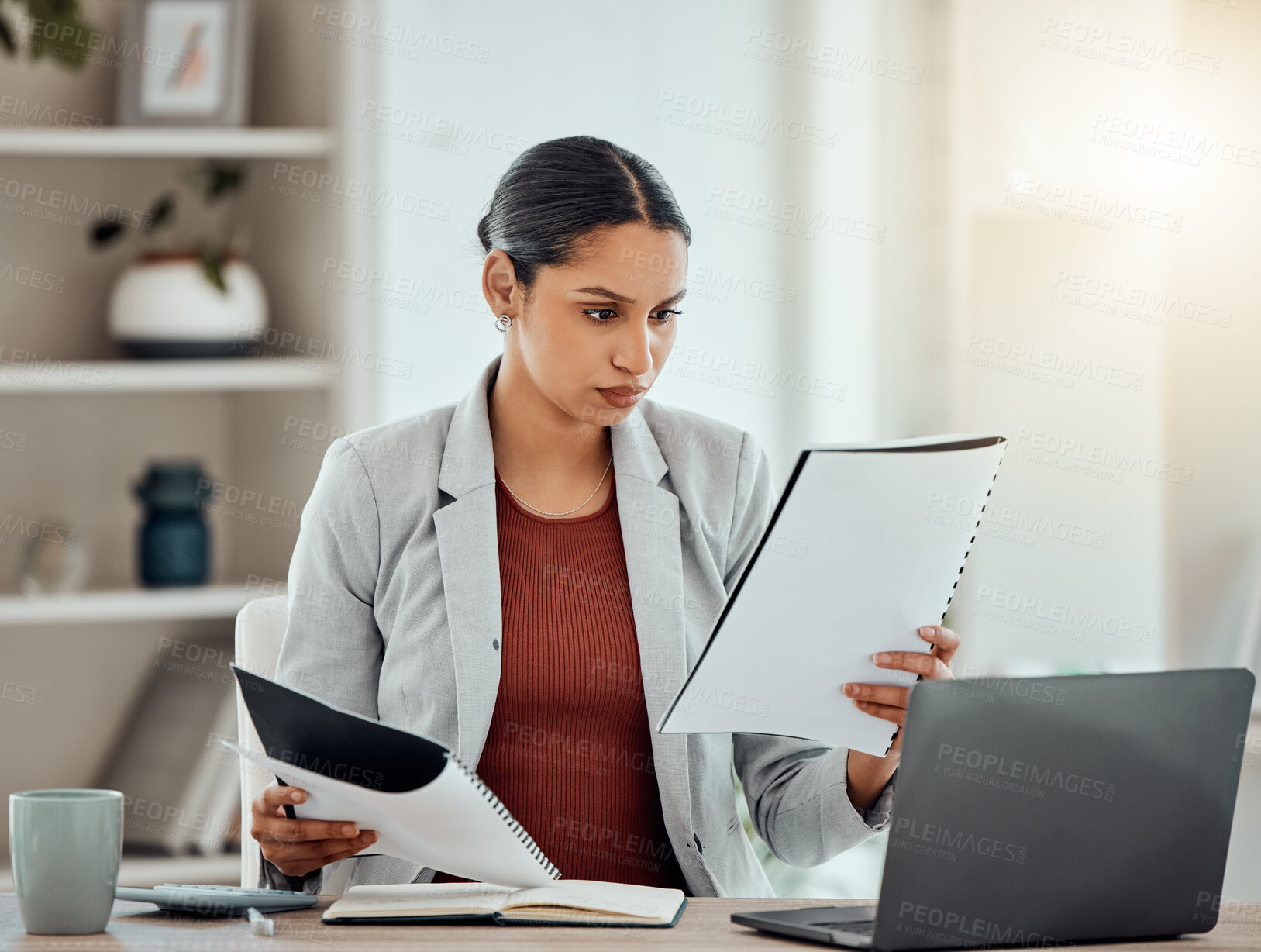 Buy stock photo Stock market, finance paperwork and budget for financial advisor, trader or investor reading, analyzing or planning with laptop. Serious worker reading, monitoring investment or cryptocurrency profit