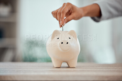 Buy stock photo Budget, money and piggy bank investment for your future plans or goals. Closeup of cropped hands putting coins into savings for financial security or growth in a poor and struggling economy.