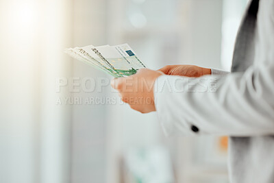 Buy stock photo Money, finance and banking in the hands of a financial advisor, investment broker or wealth manager. Closeup of cash, currency or bills being held by a foreign exchange professional or money changer