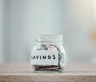 Buy stock photo Savings, money and finance with many silver coins in a jar for retirement, banking and investment growth. Start to save for college, pension or wealth with financial freedom from saved income 