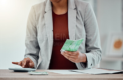 Buy stock photo Banking, accounting and finance with an insurance broker or moneychanger typing on a calculator, comparing currency and exchange rates. Closeup of a business woman holding cash, money or bank notes