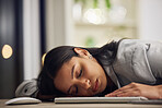 Sleeping, desk and office worker feels exhausted while working. Stress, headache and focus problem in your unhealthy workplace. Overworked, tired and feeling anxious while you stay to do overtime.