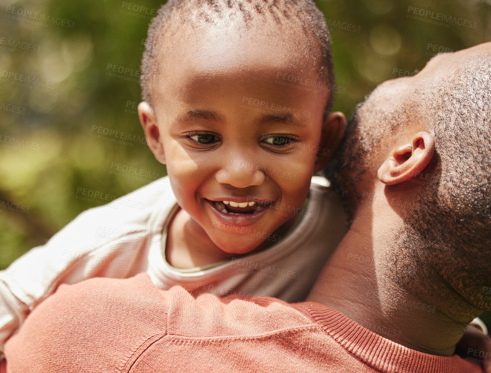 Buy stock photo Happy, child and father in nature with smile of joy for quality time, holiday or weekend in the outdoors. Love, care and parent embracing his kid and having playful fun outside on a warm summer day.