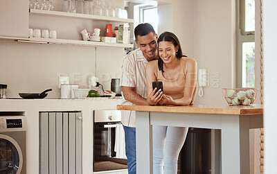 Buy stock photo Happy, loving and texting couple on phone and streaming the internet or social media while bonding at home. Boyfriend and girlfriend showing love and affection while watching together online