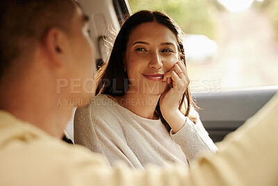 Buy stock photo Happy, in love and smiling woman on road trip staring at her charming, caring and romantic husband in a car. Couple in a loving relationship traveling on holiday, getaway and honeymoon together