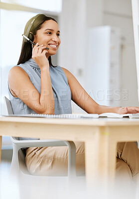 Buy stock photo Ready to help, happy call center agent selling insurance helping a customer or client via her headset at help desk. Contact us via our friendly sales service support centre and learn about us