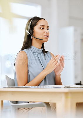 Buy stock photo Call center agent, sales advisor and telemarketing employee listening to a client giving them their payment data. Call centre professional giving customer support services about us at her help desk