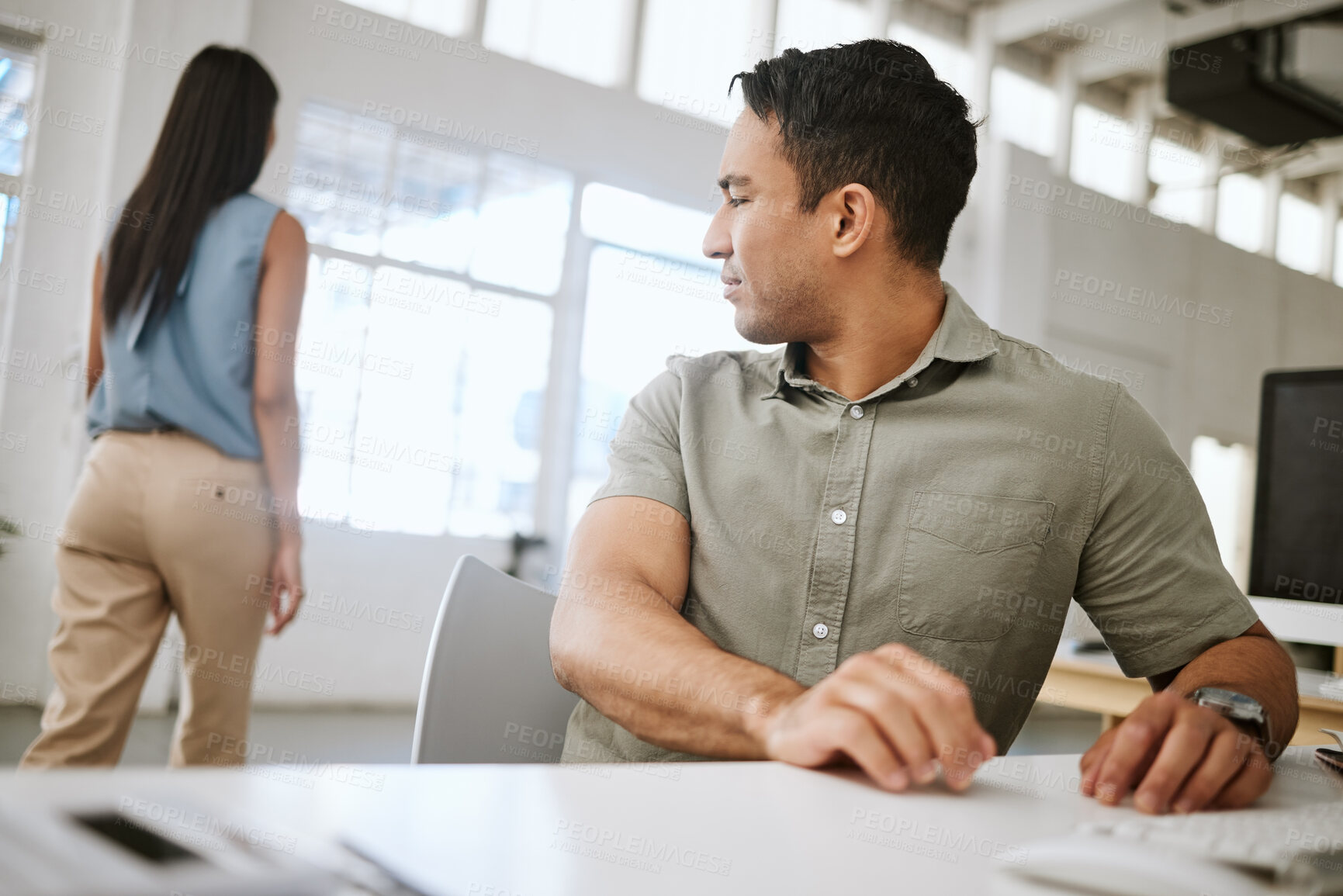 Buy stock photo Sexual harassment, desire and suggestive business man in a office looking at a woman from behind. Male worker staring with an inappropriate, provocative look at the body of a walking female employee