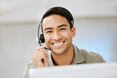 Buy stock photo Smiling, friendly call center agent with headset for online consulting in an IT tech agency. Face of male ecommerce support professional offering virtual assistance to web user or contact us hotline

