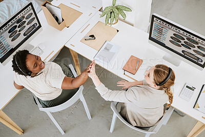 Buy stock photo Teamwork, call center and high five between colleagues while celebrating a sale, reaching target or success at desks from above. Telemarketing agents or operators offering support and good service