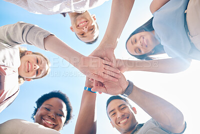 Buy stock photo Group of friends hands stacked in success and unity from below for teamwork, collaboration and outdoors bonding. Diverse team showing support, togetherness and community, united for a common goal.