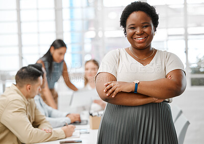 Buy stock photo Motivated, confident and happy female leader standing with her arms crossed in the boardroom with colleagues in the background for a meeting. Portrait of a business woman with a positive mindset