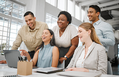 Buy stock photo Cheerful, joyful professional business people looking at laptop, browsing funny videos online and bonding on break in office at work. Corporate, diverse and young colleagues searching the internet