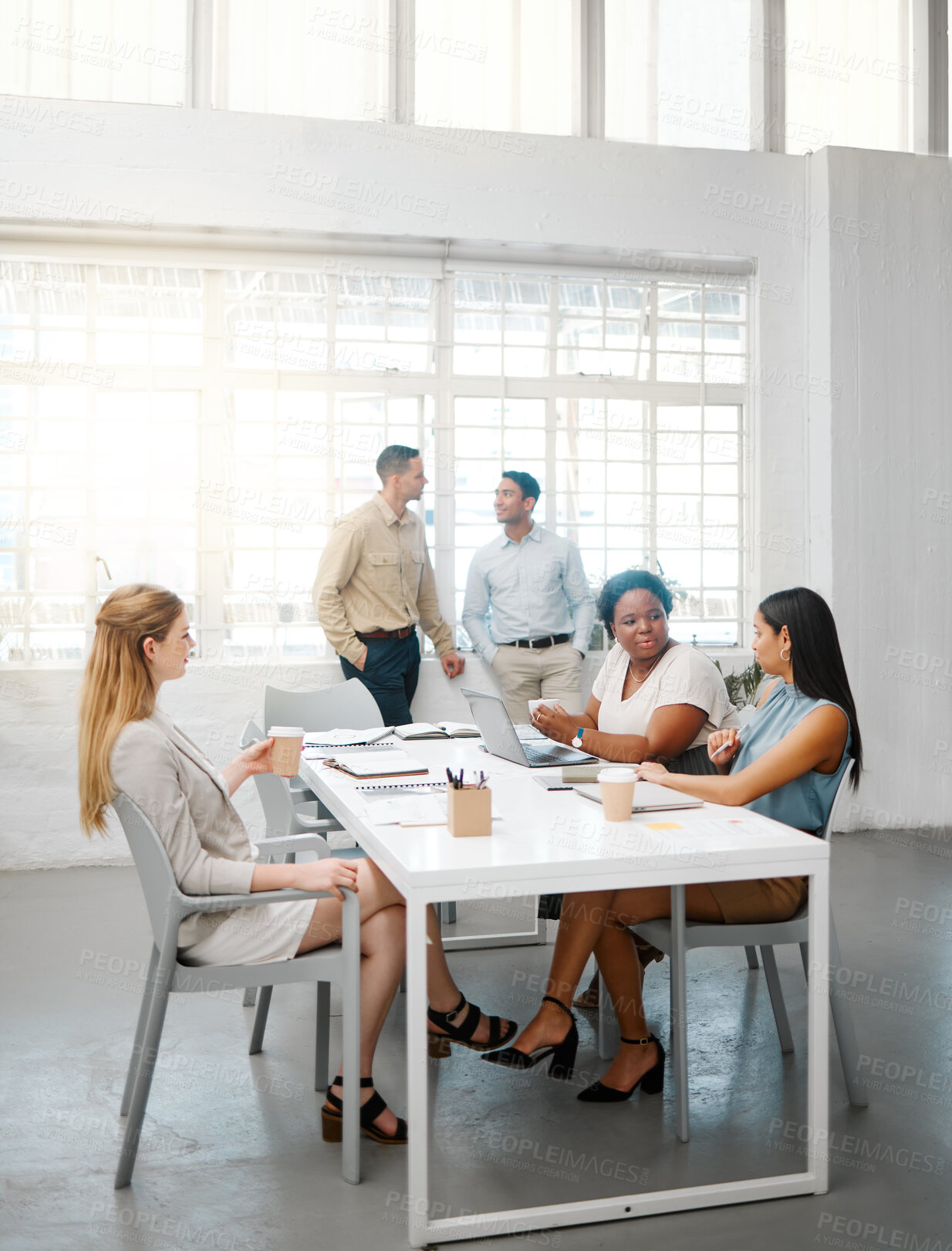 Buy stock photo Corporate, professional and serious business people talking in meeting, discussing and making conversation in a modern office together at work. DIverse, young and concentrated colleagues planning
