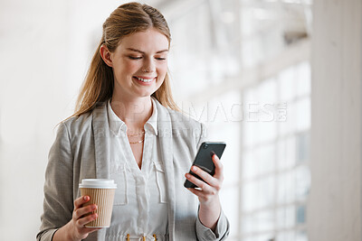 Buy stock photo Phone, coffee and online of a young employee texting on  smartphone in a corporate office. Happy, smile and mobile woman on the internet at work networking, news and social media at the office.