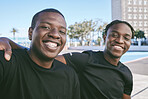 Brothers, siblings and friends spending time together, bonding as a family and enjoying the city. Portrait of young man travelling, exploring and walking in an urban town while on vacation or holiday