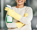 Cleaning, hygiene and chores with a spray bottle in the hands of woman wearing gloves at home. Closeup of housekeeper, cleaner or housewife ready to do housework to keep things neat, tidy and fresh
