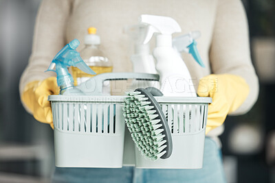 Buy stock photo Closeup of house cleaning supplies, floor scrubbing and washing tools or products in an organized basket. Cleaner, housekeeper or maid with spray bottles and hygiene equipment for work or chores