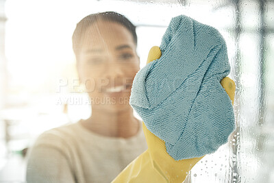 Buy stock photo Woman cleaning window, with a cloth in rubber gloves and washing the shower cabin. Glass, hygiene and a female maid or cleaner scrubbing with a special spray and fabric doing chores. 