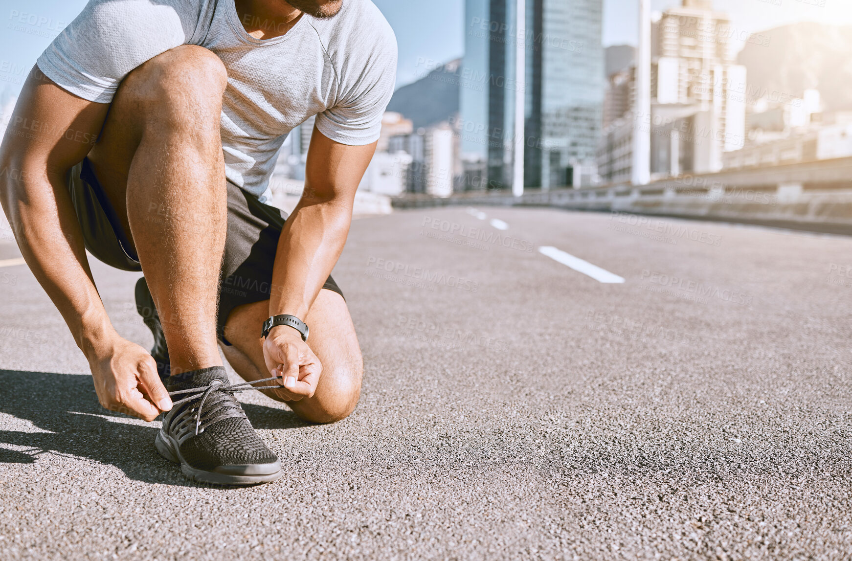 Buy stock photo Tie shoes, wellness and fitness male runner ready for run, exercise and workout or cardio training. Healthy, fit and active male jogger preparing for jogging, exercising or physical activity