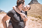 Piggyback, happy and in love couple having fun, being active and enjoying quality time together outdoors. Cute, sweet and loving boyfriend and girlfriend bonding on an adventurous and cheerful date