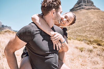 Buy stock photo Piggyback, happy and in love couple having fun, being active and enjoying quality time together outdoors. Cute, sweet and loving boyfriend and girlfriend bonding on an adventurous and cheerful date