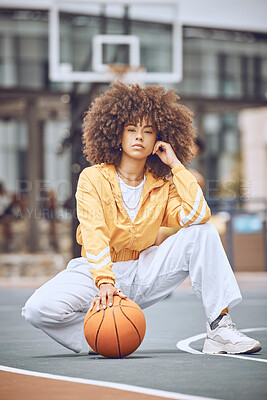 Buy stock photo Basketball player on court, getting ready for game and looking serious before fitness exercise outside. Portrait of a black female sports person with an afro playing, training and exercising