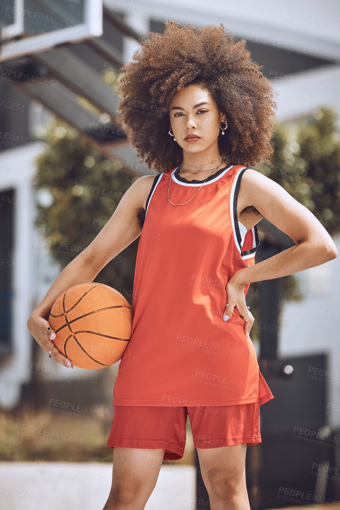 Buy stock photo Basketball court, woman player or sports person with afro looking serious at training, workout and exercise or competition ball game. Fitness portrait of healthy athlete with motivation or vision