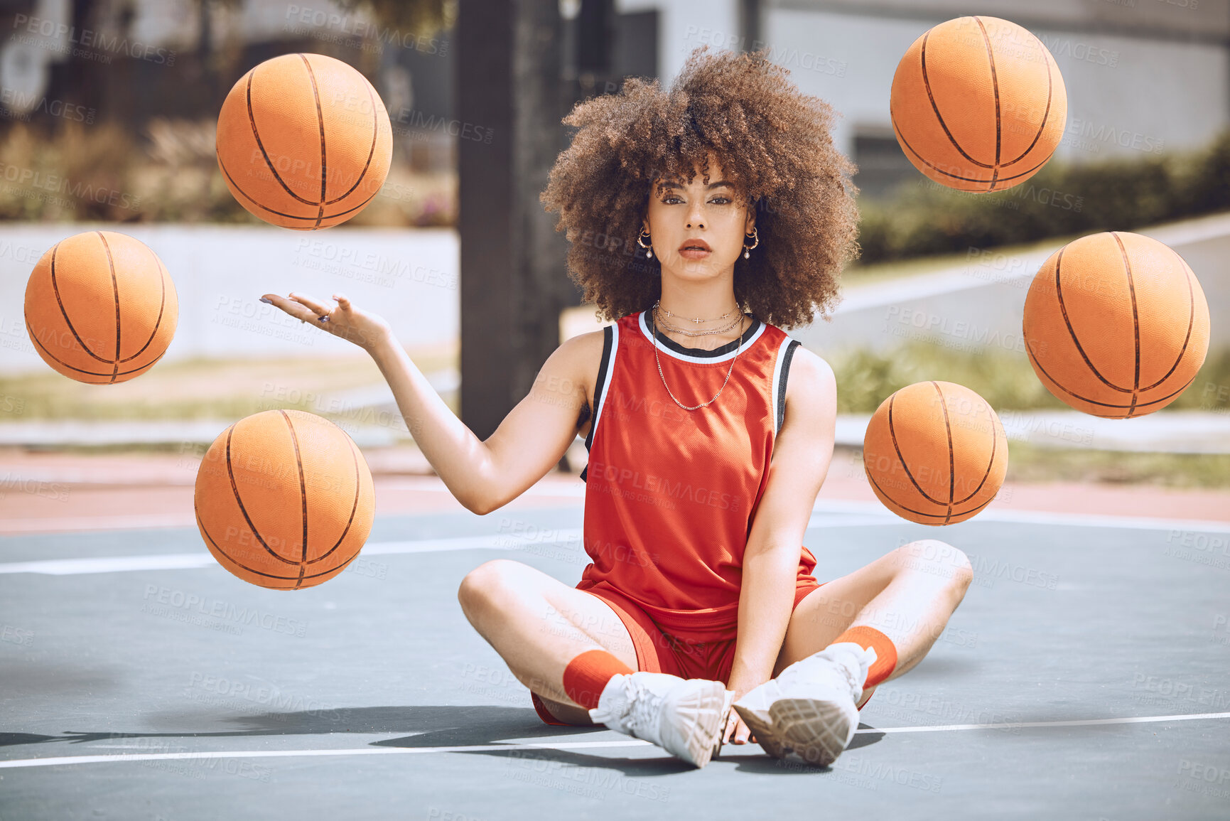 Buy stock photo Female basketball player sitting with balls in the air on a court, learning fitness training and doing sport exercise and workout outside. Portrait of a black woman playing game and looking confident