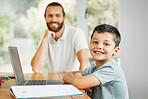 Learning, teaching and smiling little boy doing home school work at a computer indoors. Happy son with caring father in the background ready to learn, study and have digital fun at the family house