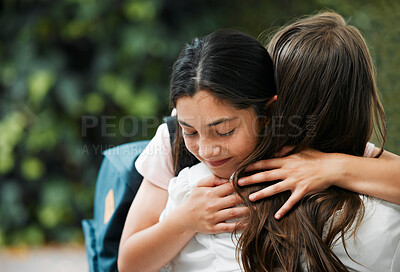 Buy stock photo Family hugging on first day of school, mother greeting girl and giving embrace before school education in the morning. Mom and kid hugging at park, holding and showing affection before leaving 