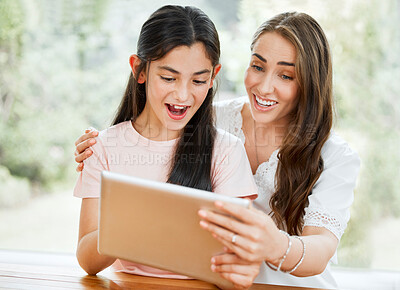 Buy stock photo Mother, tablet and child looking excited about learning together on an educational app. Parent, support and caring for your kids future goals. Mom bonding with daughter while teaching her online.