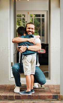 Buy stock photo Hugging, love and care between a father and son bonding outdoors at their family home. Loving, positive and smiling man embracing his little boy. Happy male showing his child affection while playing.