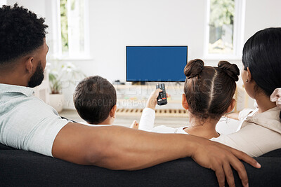 Buy stock photo Blue screen, chroma key tv with a relax family watching and enjoy streaming movies, series and entertainment copy space. Back view of parents and kids spending leisure time viewing television