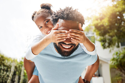 Buy stock photo Fun father playing with his young daughter on his back in their family home garden bonding together. Small child laughing and enjoying happy, silly childhood lifestyle with loving parent