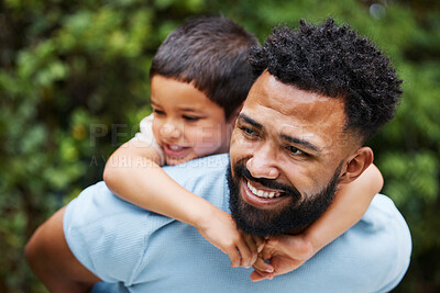 Buy stock photo Happy father with son on piggyback while smiling, laughing and playing in a park outdoors. Cheerful, loving and caring dad relaxing, bonding and enjoying fun day with playful, cute and adorable boy 