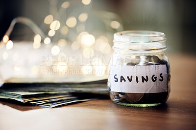 Buy stock photo Savings jar, money notes and change of saving for bank investment, retirement and financial safety. Closeup of financial growth after a banking finance budget and spending less to save for the future