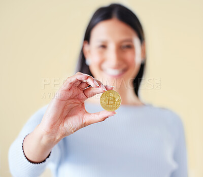 Buy stock photo Bitcoin, money and coin of a woman trader or broker holding a real cryptocurrency or virtual token. Female investor happy about her investment, trading and getting value for financial growth.