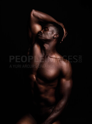 Buy stock photo Sensual, nude and black man on dark background with muscular body, natural or dim light. Confident, African American male or strong person shirtless, athletic or bodybuilder with wellness or creative