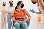 Vaccine, injection and medicine treatment for covid, flu and pandemic disease with nurse, healthcare or medical professional. Stylish, edgy and creative office woman with mask getting injected in arm