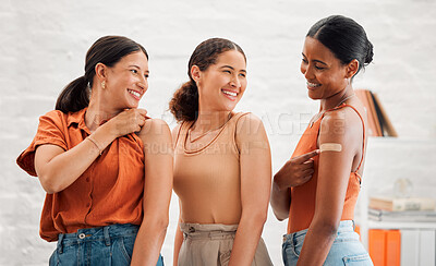 Buy stock photo Antiviral immunity, covid vaccine and showing arms with band aid plaster after an injection in a clinic. Diverse women recommend booster jab for protection from coronavirus, sickness and disease