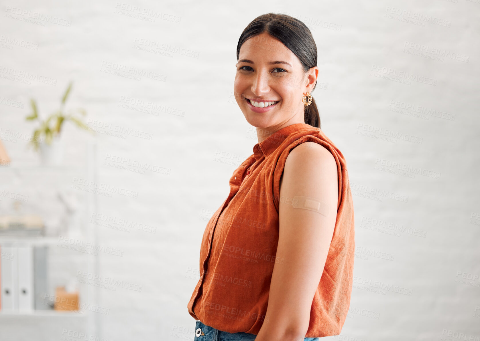 Buy stock photo Smiling, happy and motivated female entrepreneur showing great leadership in a creative office with copy space. Portrait of confident and proud entrepreneur satisfied with job in a startup business