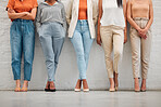 Trendy, fashionable and stylish women standing in a row for a design, marketing or stylist job interview. Casual, elegant and cool young professional females organized, ready and waiting in line