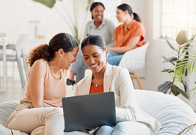 Buy stock photo Group of business women on a laptop sitting, laughing looking at social media during a break. Happy ladies bonding on a couch at work. Excited team of girls celebrating new goal achieved at startup