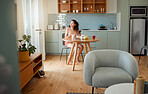 Woman on phone thinking of breakfast idea, healthy snack while drinking coffee in the morning in stylish kitchen. Relaxed and alone girl looking nostalgic in a modern apartment with interior design