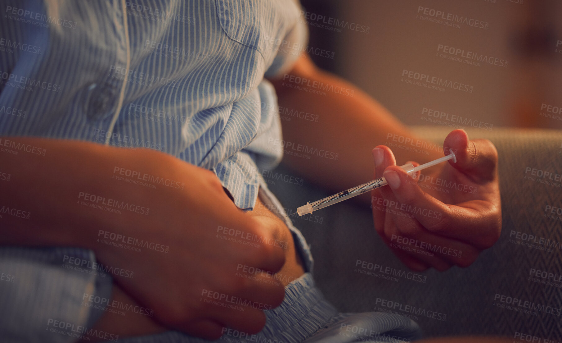 Buy stock photo Diabetes, diabetic and insulin injection of a woman with a chronic disease late at night. Hands of a female taking her daily shot of treatment with a syringe in the evening at home