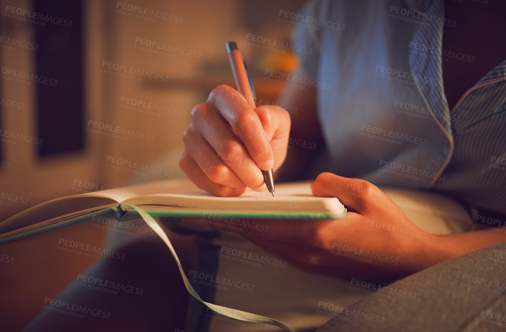 Buy stock photo Creative writing at home by female hands enjoying a calm, peaceful day off indoors. Woman making notes in a journal, expressing her feelings and thoughts while making a note of a personal experience