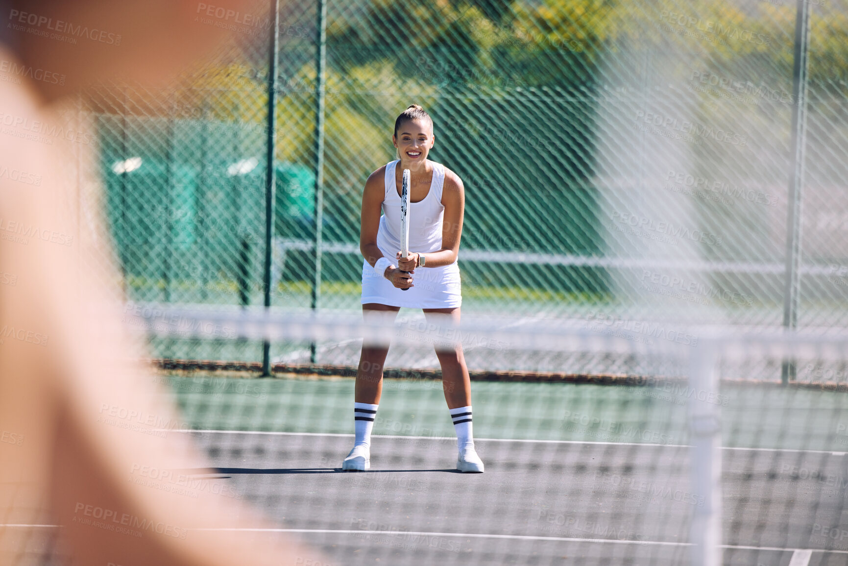 Buy stock photo Female tennis player with racket equipment or gear preparing for match at outdoor sport activity from opponent POV. Young athletic or sportswoman standing ready and looking competitive in sportswear